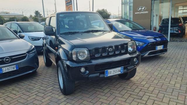 SUZUKI Jimny 1.3i 16V cat 4WD JLX Immagine 0