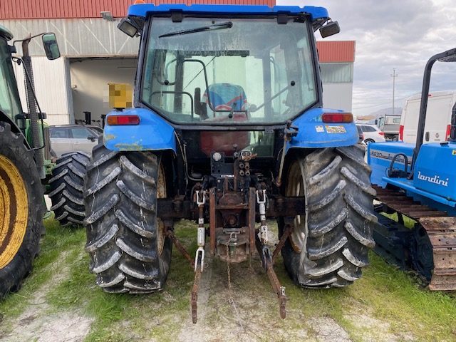 NEW HOLLAND TL100 CON FRENATURA PNEUMATICA ANNO 2002 Immagine 1