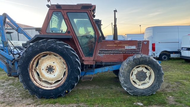 NEW HOLLAND 110/90 DT ANNO 2001 CON BRACCIO DECESPUGLIATORE Immagine 0